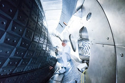 View inside the plasma vessel with graphite tile cladding.