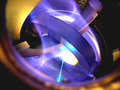 View into the "Columbia Non-neutral Torus" at Columbia University in New York. This stellarator-type magnetic field configuration designed by Professor Sunn Pedersen succeeded in magnetically capturing an electrically non-neutral plasma, a pure electron plasma. It was here also that his reflections on confining matter-antimatter plasmas started.